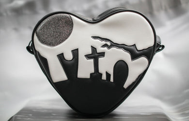 Heart shaped handbag in black and white vinyl silhouetted graveyard, glitter grey moon. 