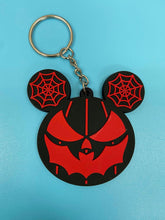 Load image into Gallery viewer, Black and red bat mouth jack-o-lantern with spiderweb mouse ears keychain.