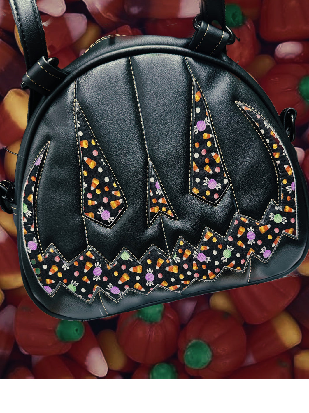 Handcrafted MissChievous Handbag- Black and Candy fabric