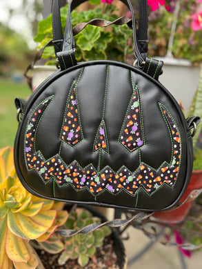 Handcrafted MissChievous Handbag- Black and Candy fabric