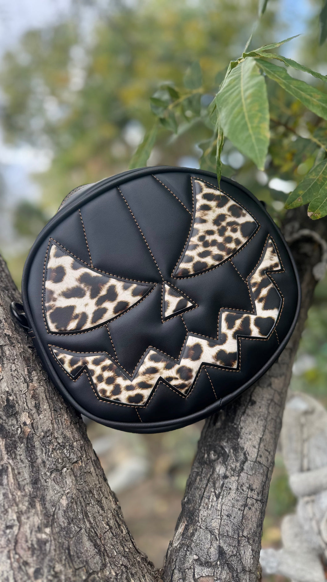Handcrafted Mean Face Bag: Matte Black and leopard vinyl