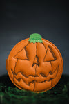 Orange jack-o-lantern snap wallet.