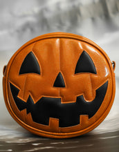 Load image into Gallery viewer, Orange Glitter vinyl and Black vinyl happy pumpkin face bag. 