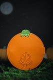 back view of orange snap wallet debossed with the Pumpkin Kult logo