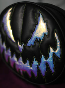 Bad Company pumpkin Black handbag with holographic textured vinyl pumpkin face with green stitching 