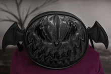 Load image into Gallery viewer, Black glitter and patent black shiny vinyl with black wings pumpkin bag, against white background with spooky black tree. 