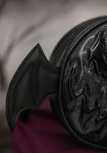 Load image into Gallery viewer, Black glitter and patent black shiny vinyl with black wings pumpkin bag, against white background with spooky black tree. Close-up of the wing. 
