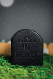 Black headstone wallet debossed with "Rest In Peace"
