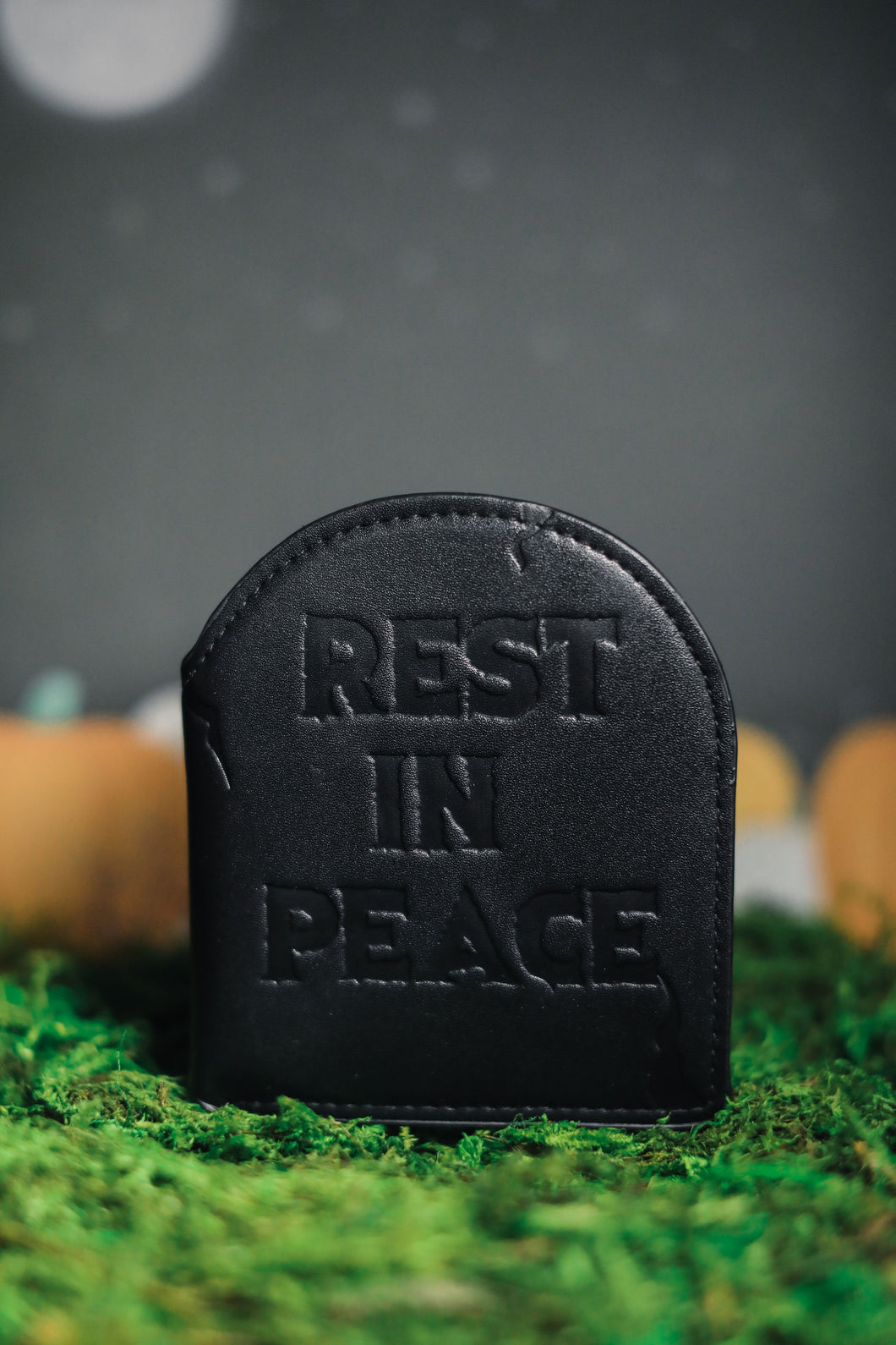 Black headstone wallet debossed with 