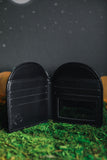 Inside view  of black headstone wallet.