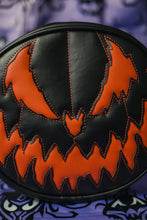 Load image into Gallery viewer, All black pumpkin handbag with matte orange pumpkin face.