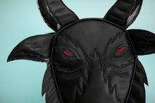 Load image into Gallery viewer, Black goat head bag with red eyes.  (Close up of the eyes)