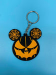Black and orange bat mouth jack-o-lantern with spiderweb mouse ears keychain.