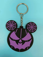 Load image into Gallery viewer, Black and purple bat mouth jack-o-lantern with spiderweb mouse ears keychain.