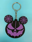 Black and purple bat mouth jack-o-lantern with spiderweb mouse ears keychain.