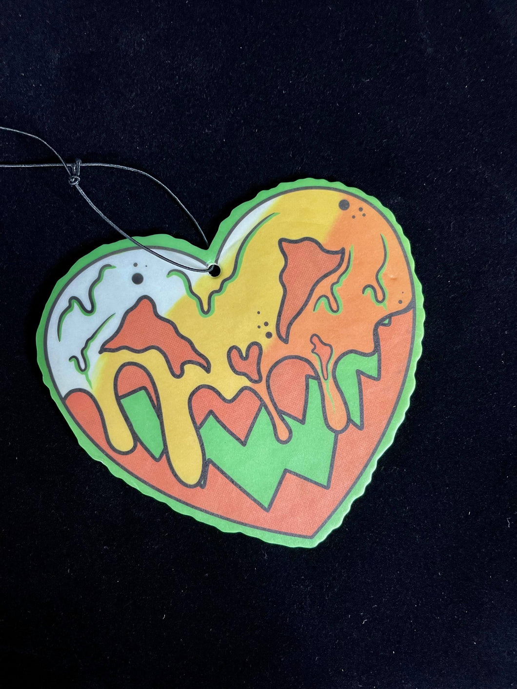 air freshener of candy corn heart with jack o lantern face.