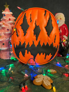 Handcrafted We Stay Creepy bag: Orange and Black