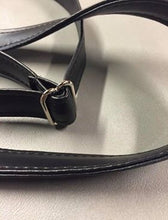 Load image into Gallery viewer, Close up of a black strap with chrome hardware