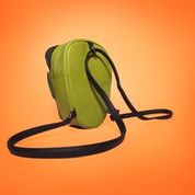 Load image into Gallery viewer, Back of monster backpack on orange background