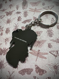 Strange and Unusual Enamel Keychain