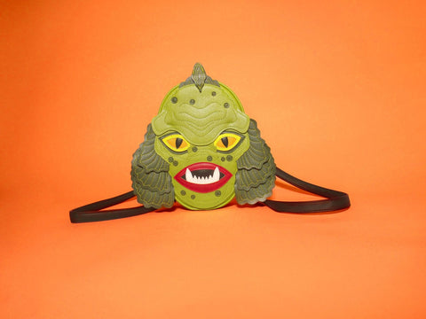 swamp monster backpack on orange background