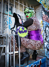 Load image into Gallery viewer, Girl dressed as monster wearing the monster bag, Glitter Purple and green glitter bag has black and white glitter pipping , green matching zipper